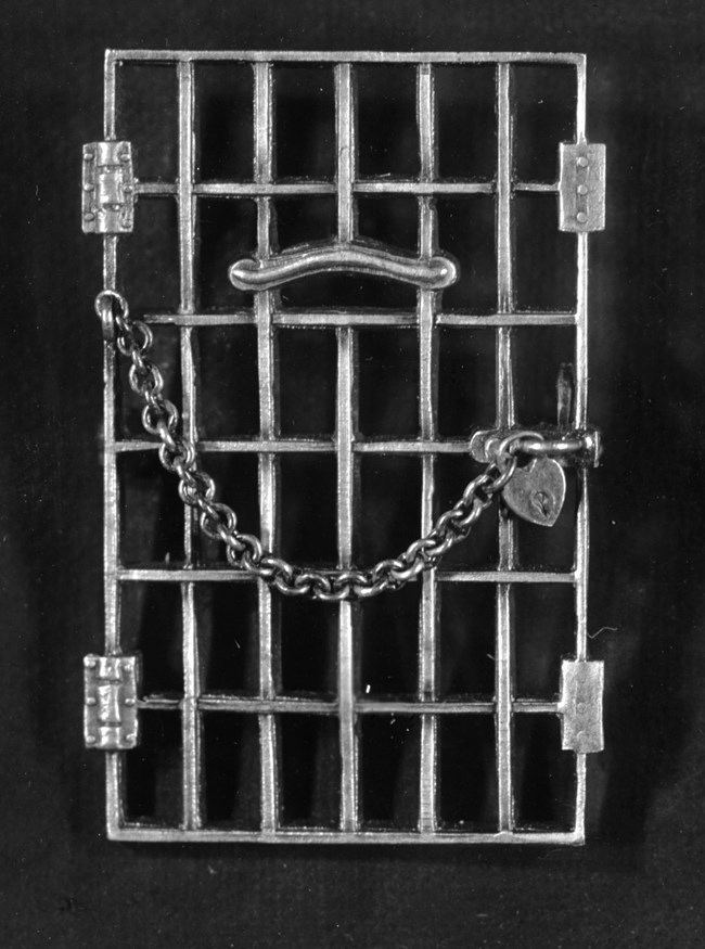 Pin of jail door with lock