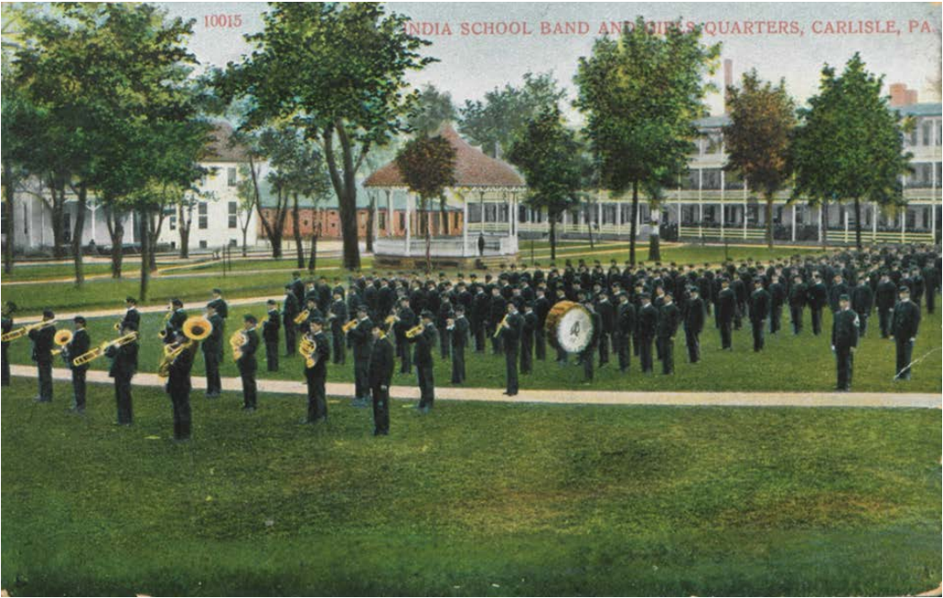 Young men in military uniforms playing instruments