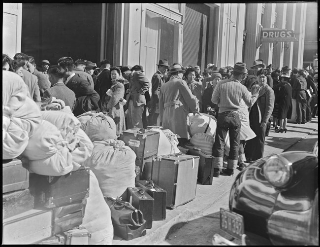 Japanese Americans awaiting to be placed in concentration camps.