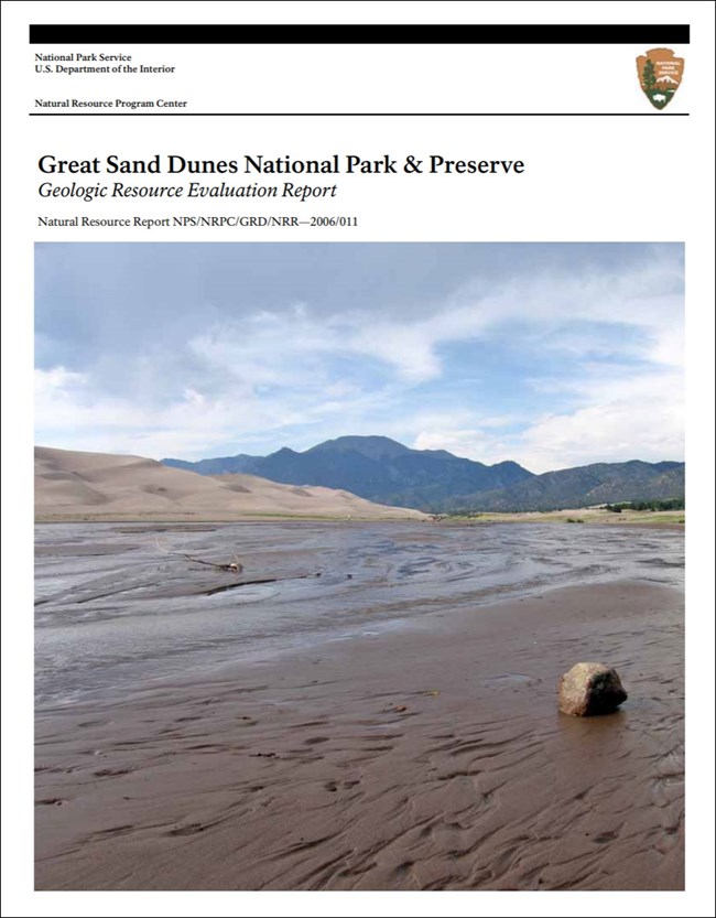 gri report cover with photo of stream, dunes, and mountains