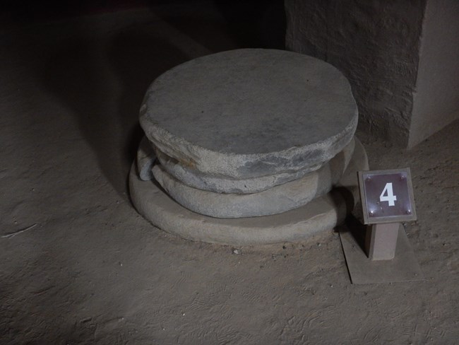 Examples of the limestone discs used as foundation stones for the columns in the great kiva.