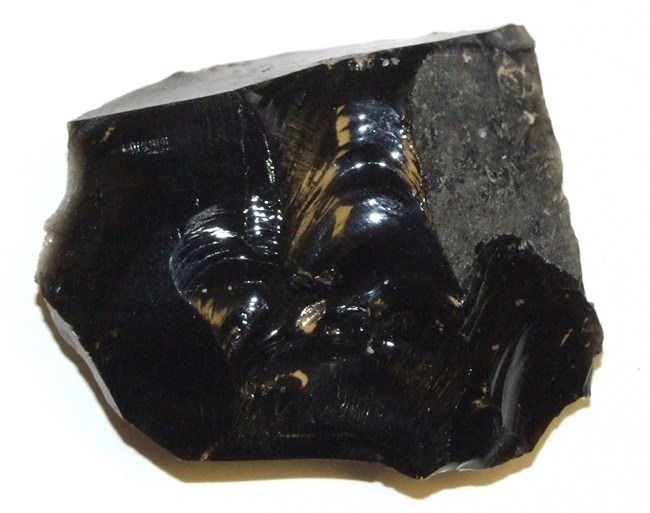 A piece of obsidian, used to make weapons, hunting tools, and jewelry.