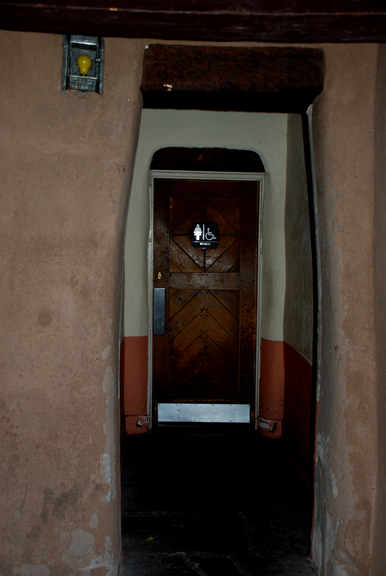 narrow doorway to current restroom