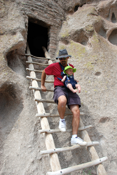man and child on ladder