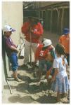 Kids make adobe bricks