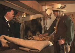 Photo of a trader bartering at Bent's Old Fort