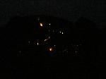 7:28pm; fire at night
