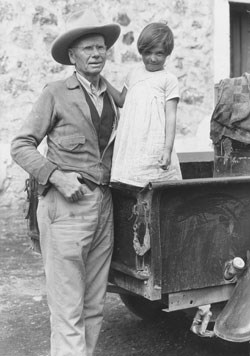 Everett Townsend with Blanca, a Mexican child in Boquillas, Mexico, 1936.