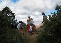 Ranger and visitors along the Lost Mine Trail