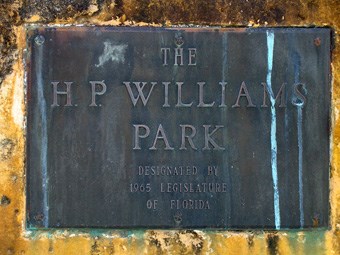 A plaque that reads, "The H.P. Williams Park. Designated by 1965 Legislature of Florida."