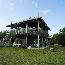 Two-story environmental education classroom on sub-tropical island.
