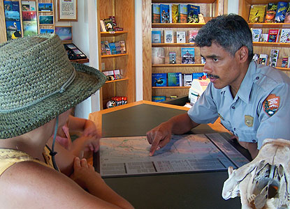 Ranger Carlos assists visitors at the Dante fascell Visitor Center.