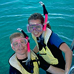 Two visitors prepare to snorkel.