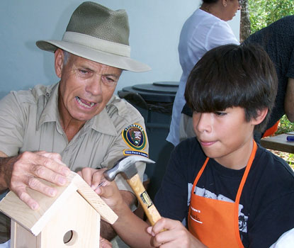 Volunteer Kevin Sullivan helps out at <i>Family Fun Fest</i>.