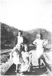 Ladies pose near Blue Heron