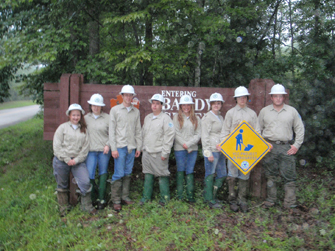 TN YCC youth standing in front of Big South Fork sign