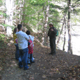 Ranger with visitors on the Bluestone Turnpike Trail