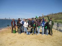 Beach grass planting volunteers cheer.