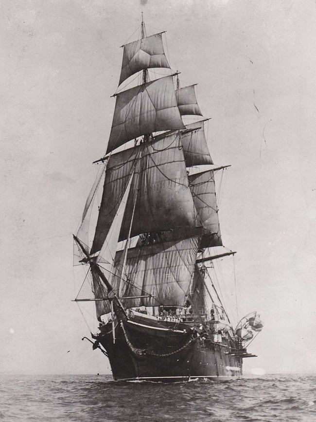 Photograph of USS Hartford sailing with full rigging.