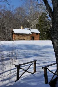 Smokehouse & Kitchen Cabin in the Snow 200 x 299 px