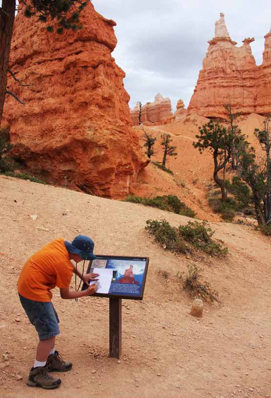 youth hiking the hoodoos, on the Queen's Garden Trail in Bryce Canyon