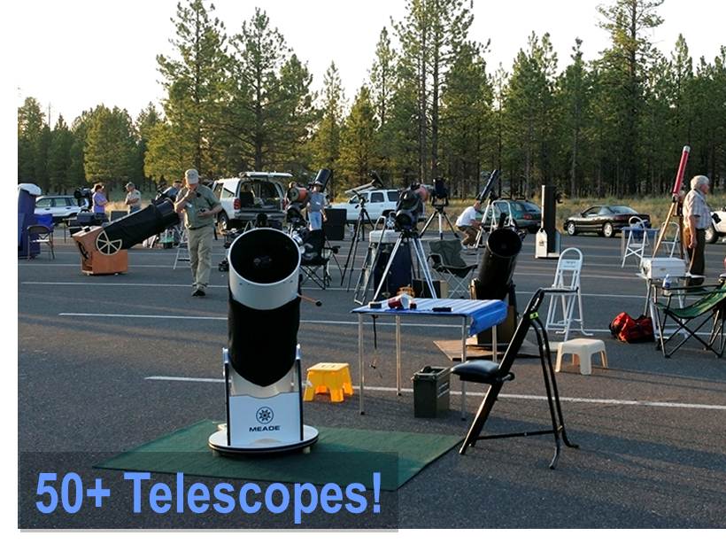 Setting up telescopes in late afternoon