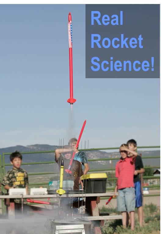 Kids watching model rocket launch