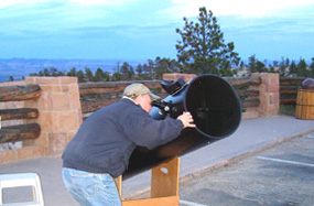 Visitor using Telescope during night sky program