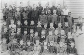 Image of fourth grade students, both black and white, at Lowman Hill School in 1892.