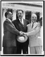 George E.C. Hayes, Thurgood Marshall, and James M. Nabrit, congratulating each other, following Supreme Court decision declaring segregation unconstitutional. Photo, May 17, 1954.