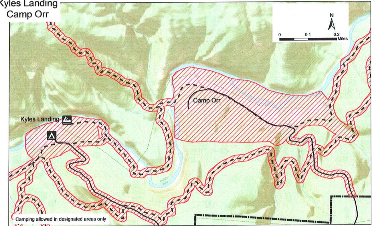 topographic map of Kyles and Camp Orr areas, no hunting safety zones shaded red, roads solid black lines, trails dashed black lines, boundary dash dot dash black line,  mileage and compass direction at top right