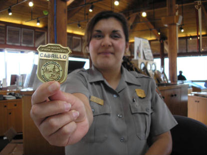 Park Ranger with Junior Ranger Badge