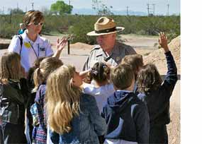 Park Ranger David Winchester assists a visiting school group.