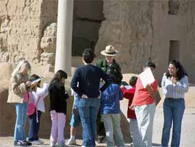Park Ranger Denise Shultz assists a school group visiting from Ironwood Elementary School, Phoenix.
