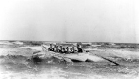 Crewmen from the Oregon Inlet Coast Guard station in a surfboat