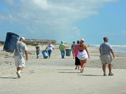 Members of Cape Lookout Mobile Sportfishermen pick up debris from the beach