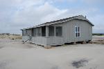 Sand covering cabin infrastructure, Great Island