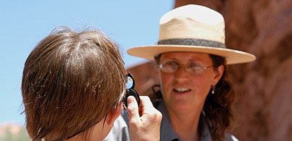 photo: A Moab 6th grader studies heat, light and sound with the Canyon Country Outdoor Education Proram