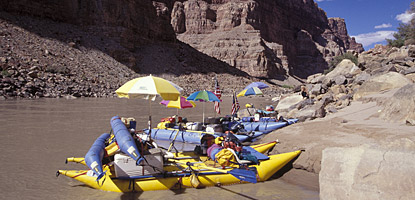 Colorful group at the scouting beach for Big Drop Two in Cataract Canyon