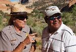 A ranger describes a petroglyph panel to a visitor.