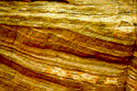 Crossbedding is shown here in the different layers of rock and the way they are merged (crushed) together