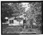 South view of Doctor's Cottage with cherry tree