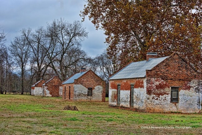 Row of brick slave/tenant cabins at Magnolia