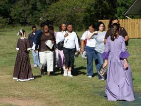 Visitors tour Oakland Plantation.