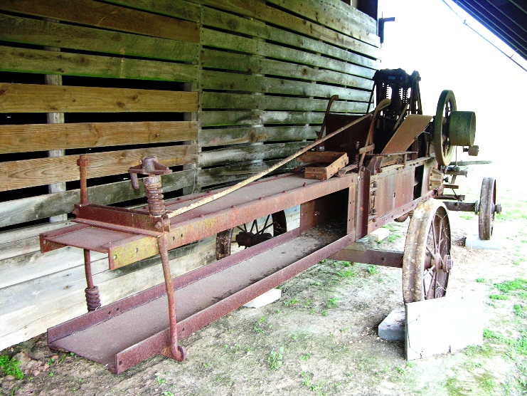 Antique hay bailer at Magnolia plantation