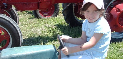 girl on tractor