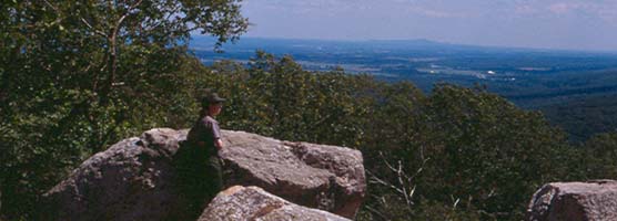 A park ranger rests for a moment at Chimney Rock.
