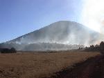 Capulin Volcano through the smoke.