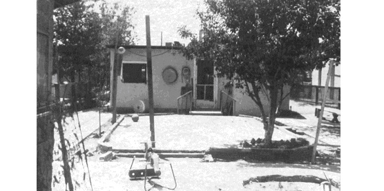 Backyard of Chamizal Tract home. The homes on the Chamizal Tract were generally small and humble.