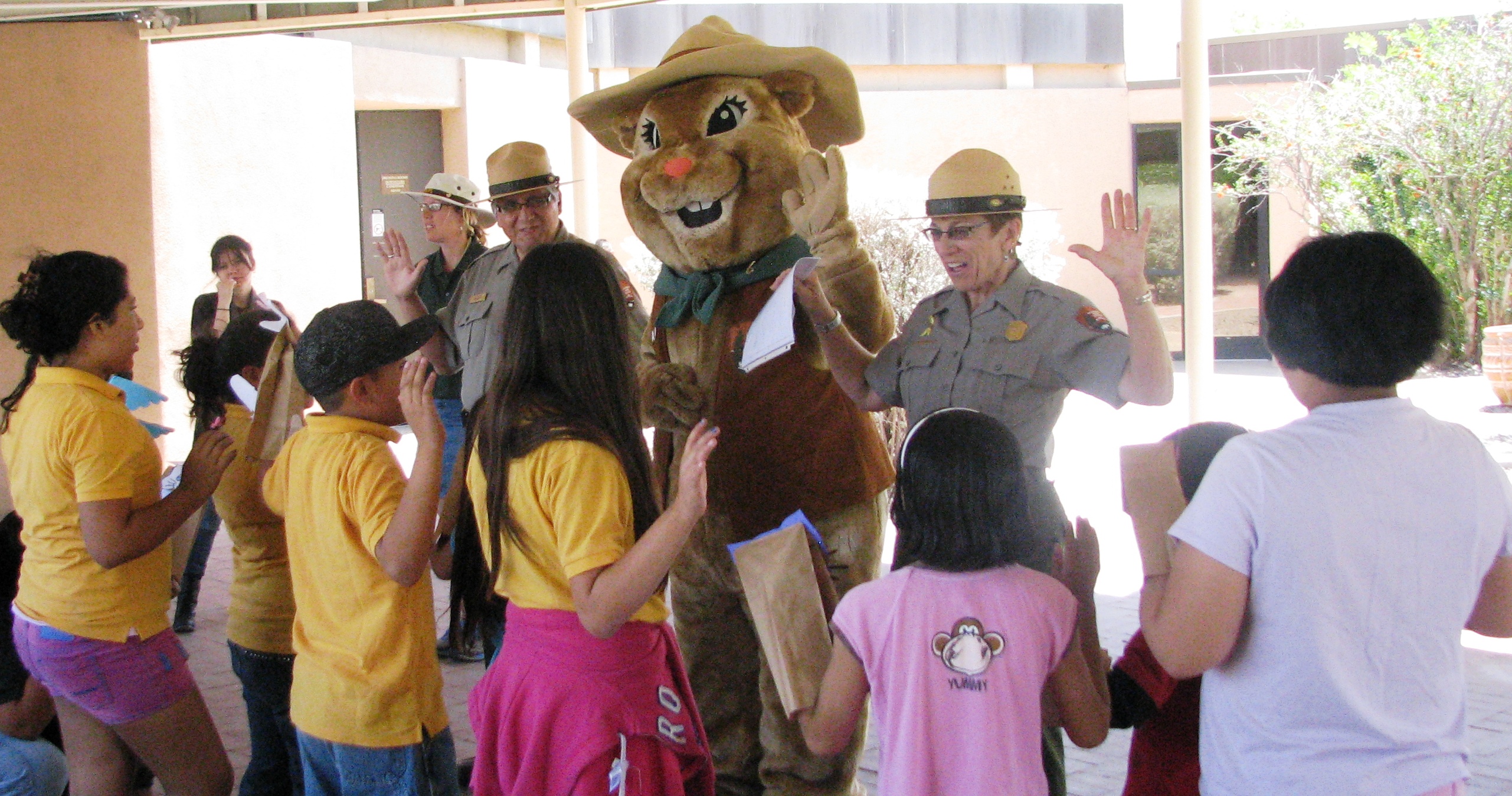 young people raising right hand to take Junior Ranger oath